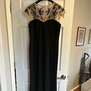 Floor length black dress with sheer shoulders. Size 12